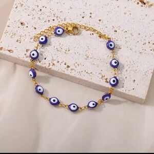 Chic Gold plated steel Bracelet with Blue Evil Eye Charms